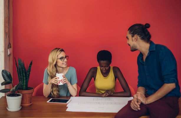 A group of young people are working together